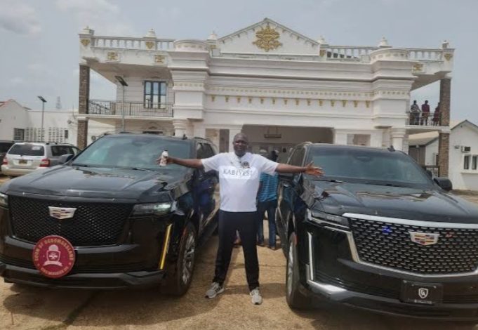 Ghandi Afolabi Olaoye and his Cadillac Escalade.