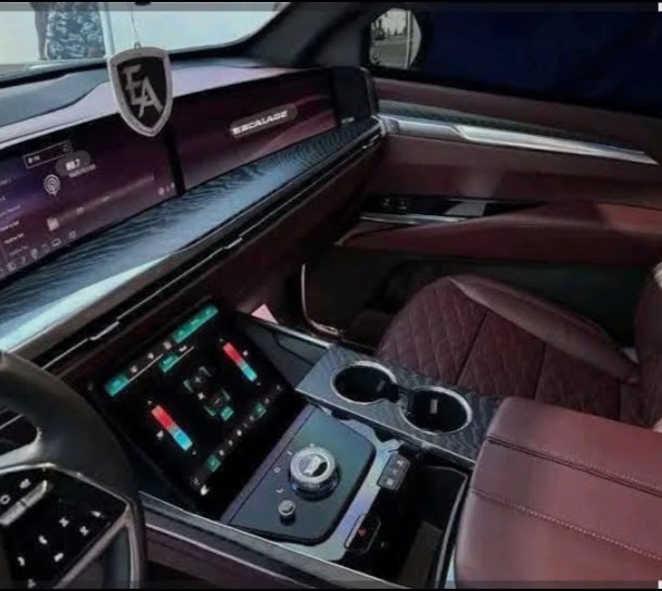 Ghandi Afolabi Olaoye and his Cadillac Escalade.