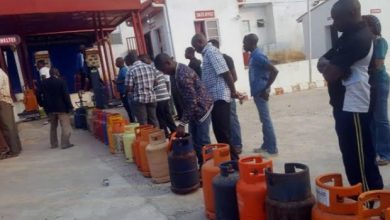 Waiting to fill up gas cylinders.