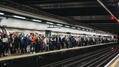 Generated crowded london station