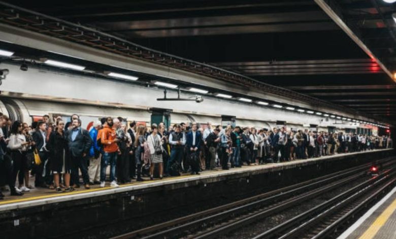 Generated crowded london station